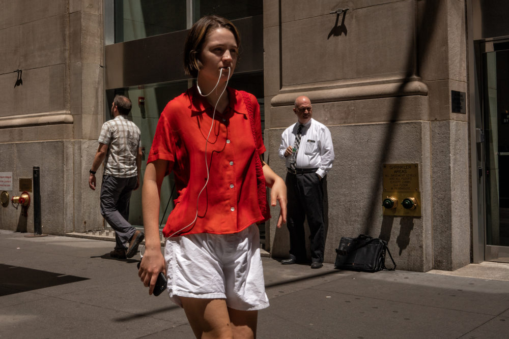 Red Blouse and Earphones, Wall Street
