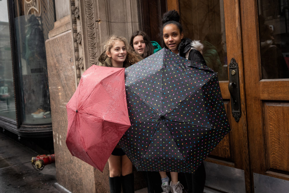 Three Girls, Two Umbrellas, Broadway